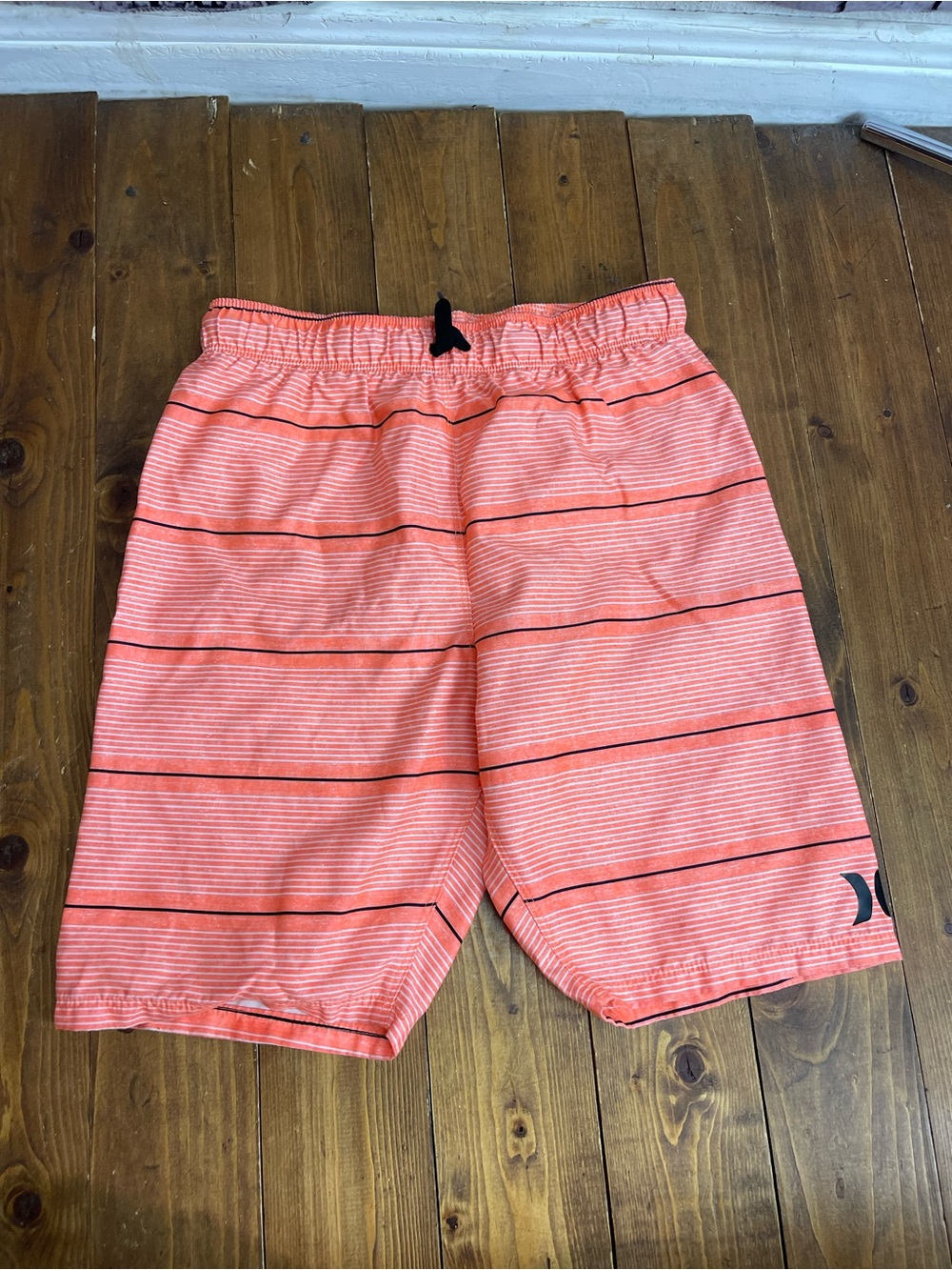 Hurley boys swim trunks size 10/12 orange stripes